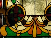 The stained glass window at the staircase of the residence