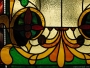 The stained glass window at the staircase of the residence