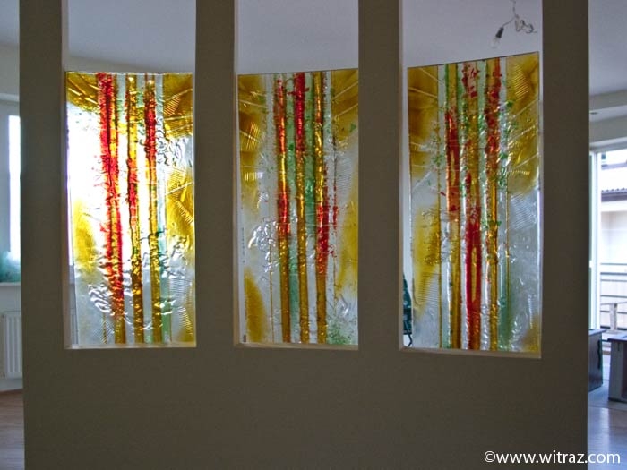 Red and yellow art glass panels in the apartment