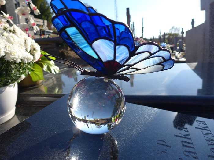 Stained glass butterfly on glass ball