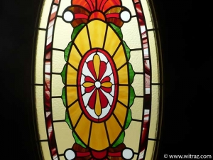 Oval-shaped stained glass in the residence door