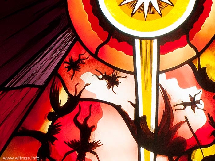 The fight between Good and Evil - stained glass in a restaurant