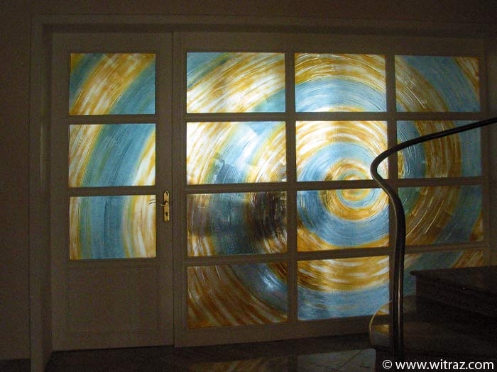 Art glass wall wit the spiral motif