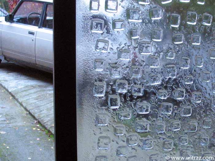 Fused art glass panel in the door