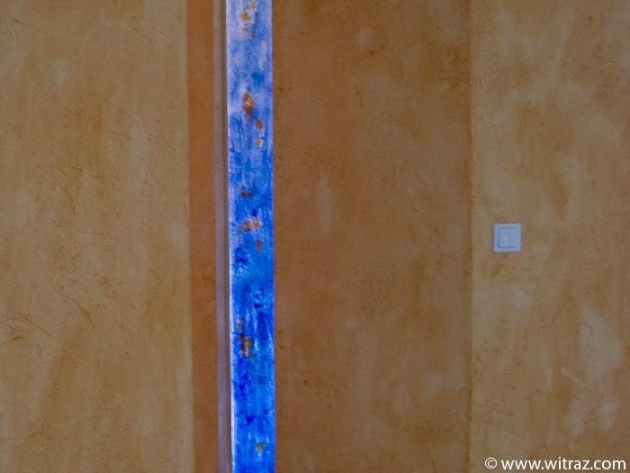 Art glass - narrow blue panels in the apartment