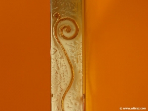 Narrow art glass panel with the spiral motif 