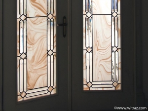 Art glazings  of doors with bevelled glass elements