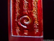 Blood-red art glass wall in the bathroom