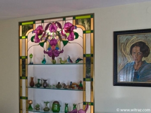 Hummingbird decorated stained glass showcase
