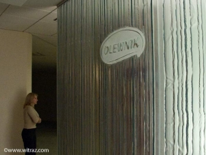 Art glass wall with company logo in Olewnik company seat