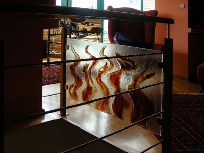 Art glass railing with flames motif