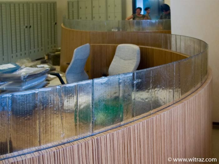 Bent art glass as the office furniture inlay in the bank