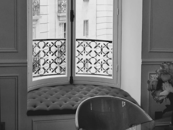 Bay window in parisian tenement house
