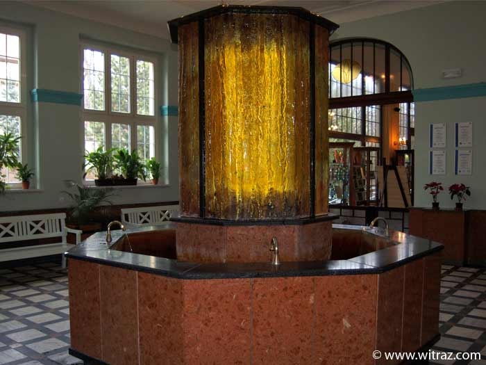Bent art glass casing of the fountain in the pump-room of Polanica Zdroj resort house