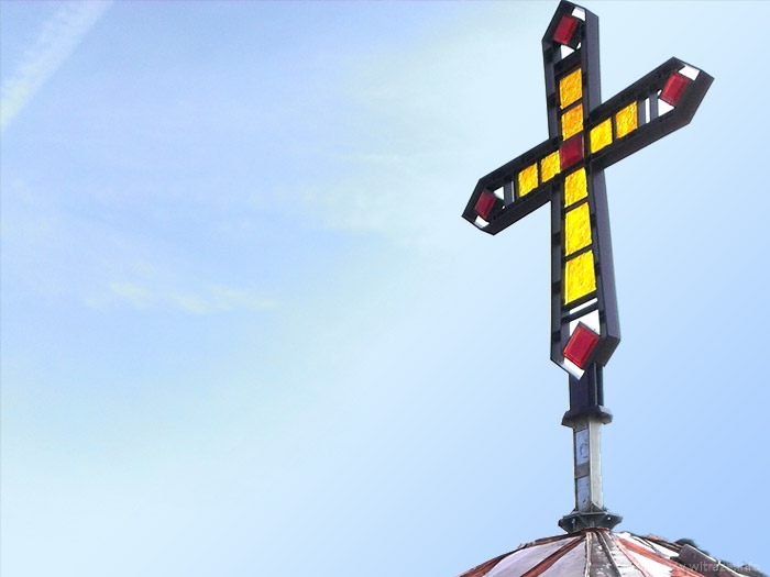 Glass cross on the roof of John Paul II Center in Cracow