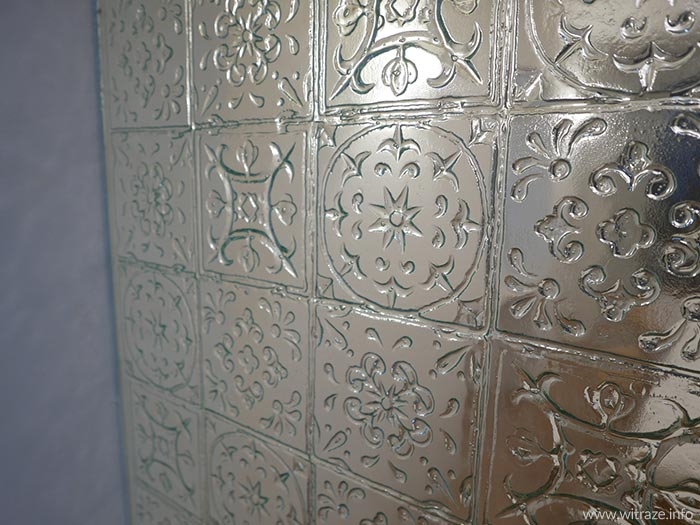 Slumped glass decorative partition